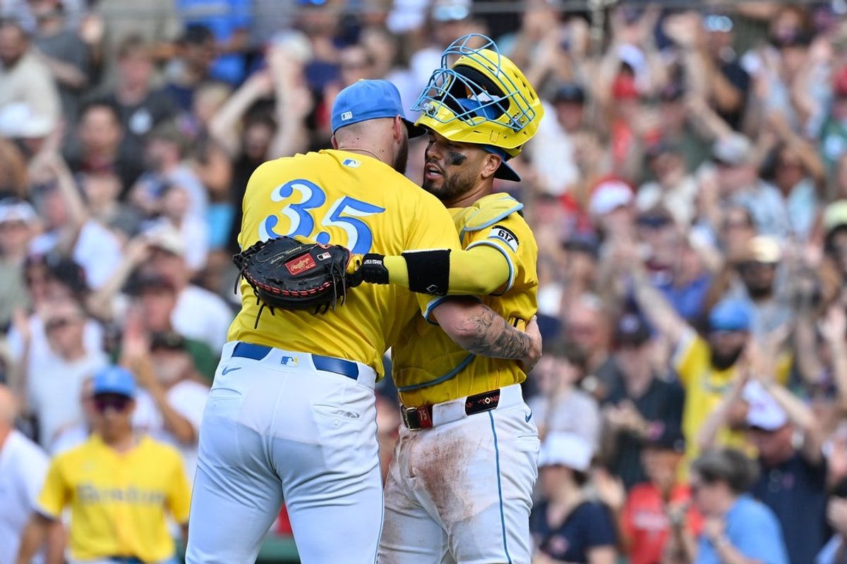 Jul 12, 2025; Boston, Massachusetts, USA;  Boston Red Sox starting pitcher Garrett Crochet (35) and catcher Carlos Narvqaez (75) celebrate defeating the Tampa Bay Rays at Fenway Park. Mandatory Credit: Eric Canha-Imagn Images