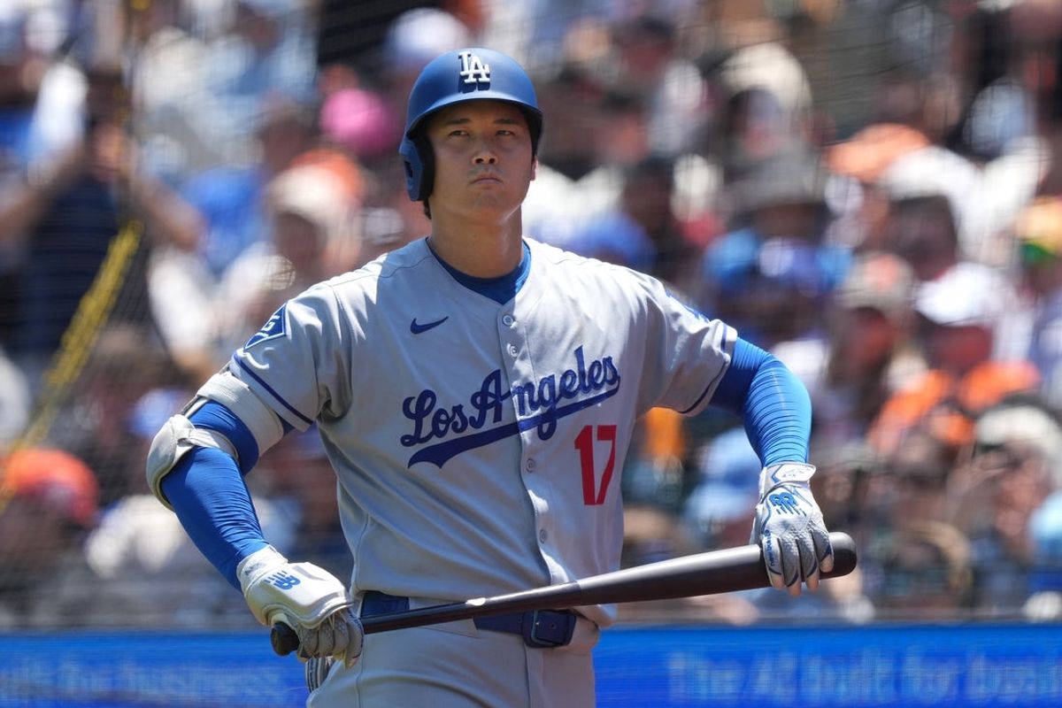 Jul 12, 2025; San Francisco, California, USA; Los Angeles Dodgers starting pitcher Shohei Ohtani (17) prepares to bat against the San Francisco Giants during the third inning at Oracle Park. Mandatory Credit: Darren Yamashita-Imagn Images