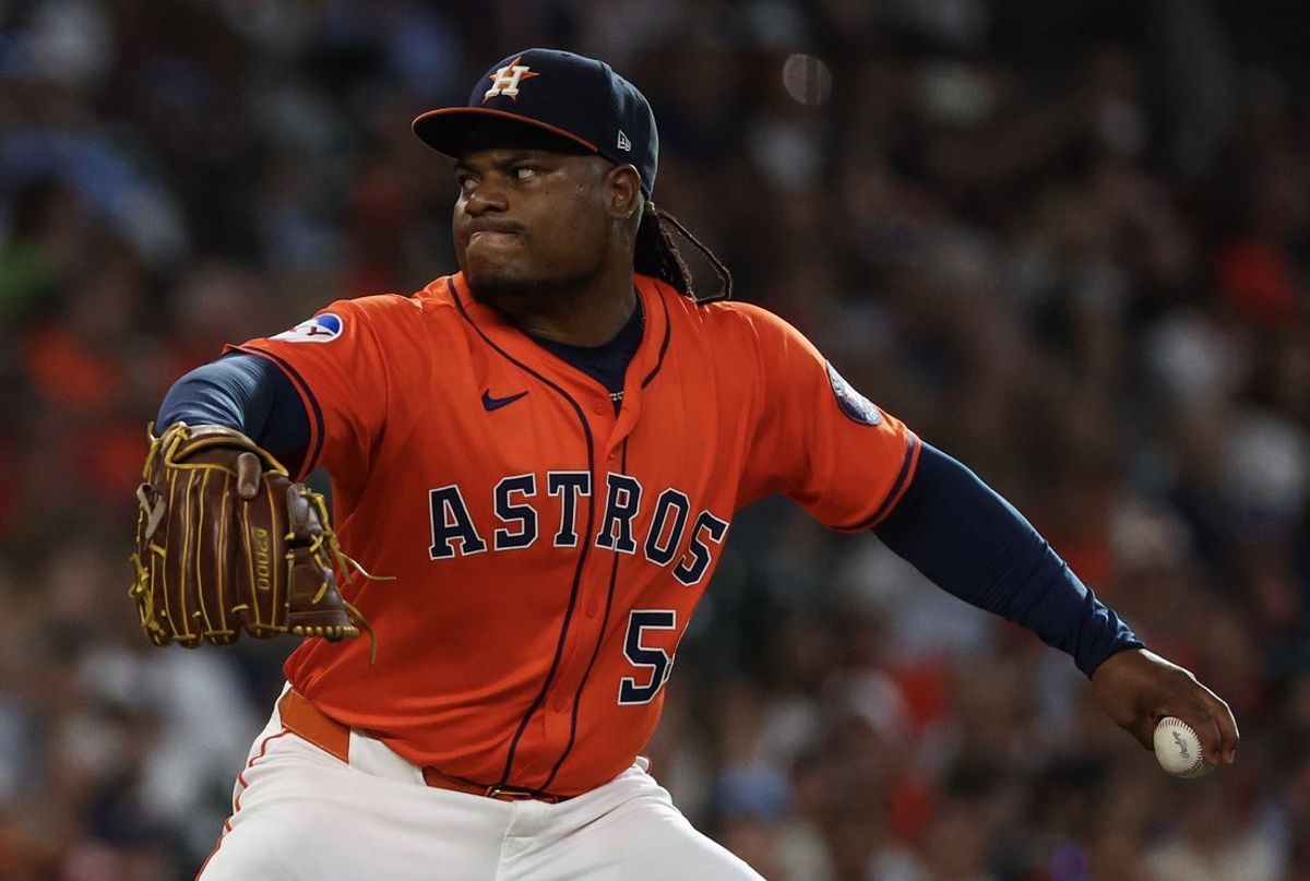 Jul 12, 2025; Houston, Texas, USA; Houston Astros starting pitcher Framber Valdez (59) pitches against the Texas Rangers in the first inning at Daikin Park. Mandatory Credit: Thomas Shea-Imagn Images