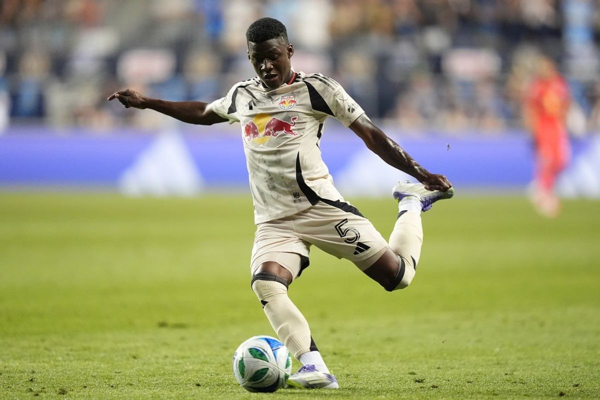 Jul 12, 2025; Chester, Pennsylvania, USA; New York Red Bulls defender Omar Valencia (5) passes the ball against the Philadelphia Union in the second half at Subaru Park. Mandatory Credit: Kyle Ross-Imagn Images