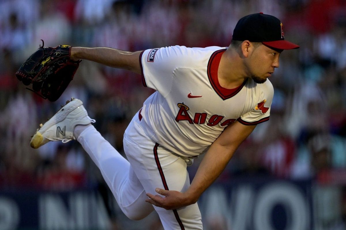 Jul 12, 2025; Anaheim, California, USA;  Los Angeles Angels starting pitcher Yusei Kikuchi (16) delivers to the plate during the third inning against the Arizona Diamondbacks at Angel Stadium. Mandatory Credit: Jayne Kamin-Oncea-Imagn Images