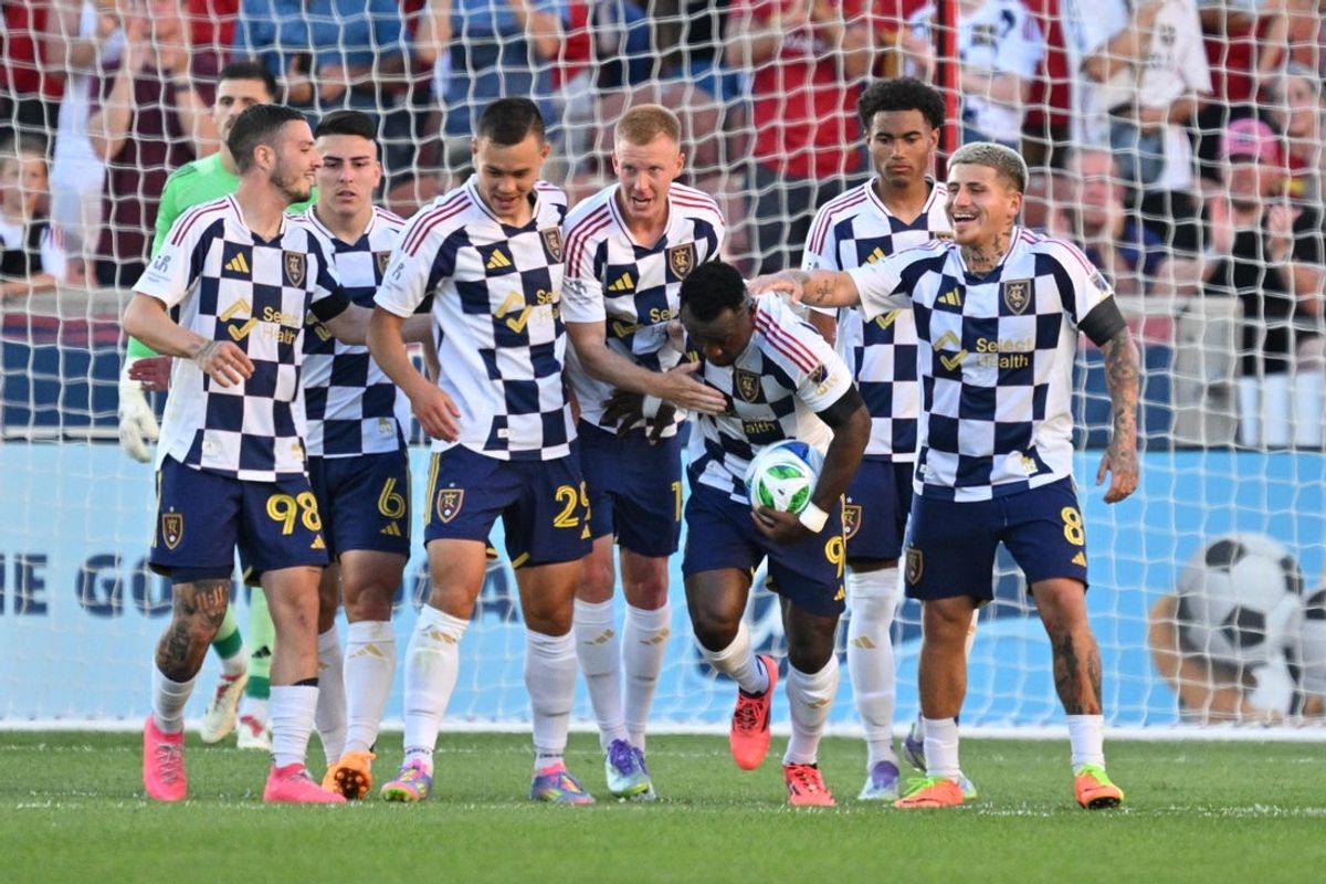 Jul 12, 2025; Sandy, Utah, USA;  Real Salt Lake forward William Agada (9) celebrates with teammates after scoring a goal in the first half against Houston Dynamo FC at America First Field. Mandatory Credit: Jamie Sabau-Imagn Images