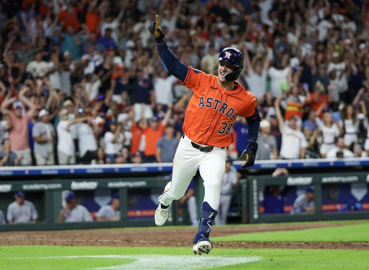 Jul 12, 2025; Houston, Texas, USA; Houston Astros third baseman Zack Short (38) reacts after his game winning hit against the Texas Rangers in the 11th inning at Daikin Park. Mandatory Credit: Thomas Shea-Imagn Image