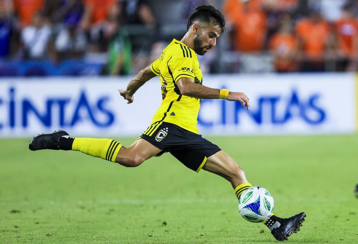 Jul 12, 2025; Cincinnati, Ohio, USA; Columbus Crew forward Diego Rossi (10) kicks the ball against FC Cincinnati in the second half at TQL Stadium. Mandatory Credit: Katie Stratman-Imagn Images
