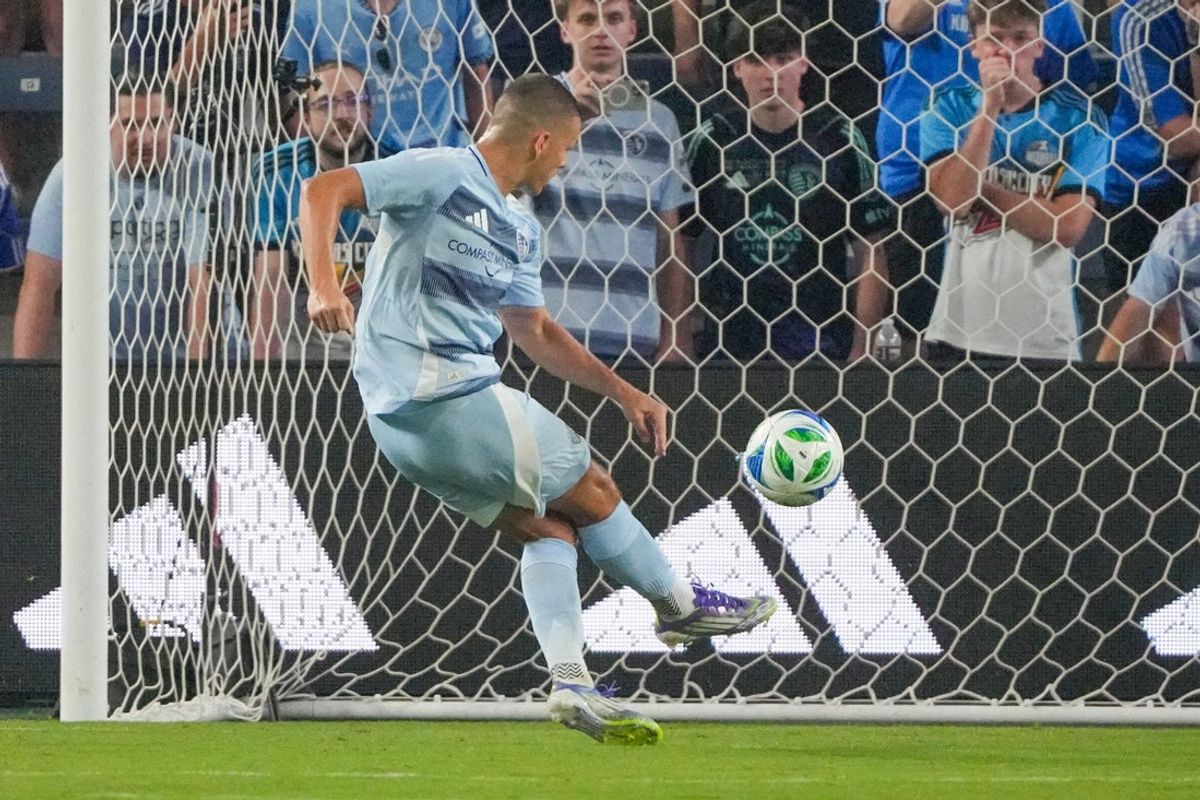 Jul 12, 2025; Kansas City, Kansas, USA; Sporting Kansas City forward Dejan Joveljic (9) scores against Seattle Sounders FC on a penalty kick during the second half of the match at Children's Mercy Park. Mandatory Credit: Denny Medley-Imagn Images