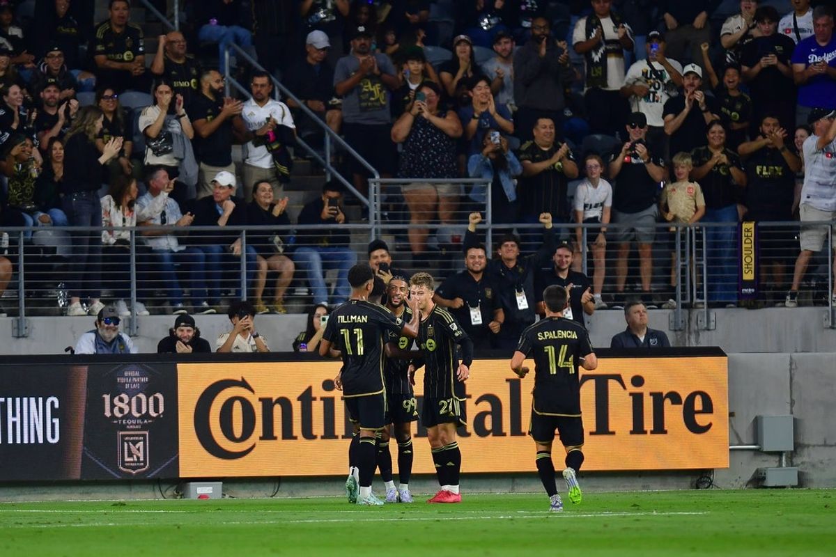 Jul 12, 2025; Los Angeles, California, USA; LAFC celebrates the goal scored by forward Nathan Ordaz (27) against FC Dallas during the first half at BMO Stadium. Mandatory Credit: Gary A. Vasquez-Imagn Images