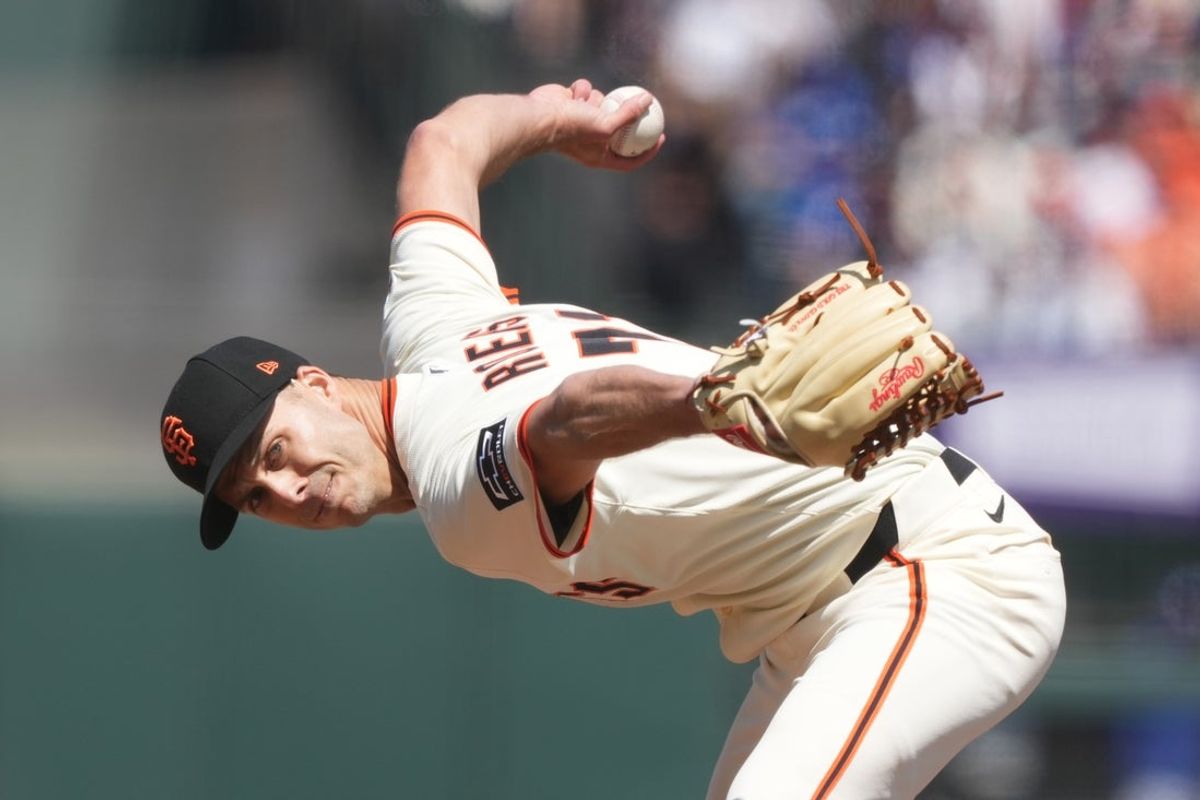 Jul 12, 2025; San Francisco, California, USA; San Francisco Giants pitcher Tyler Rogers (71) throws a pitch against the Los Angeles Dodgers during the ninth inning at Oracle Park. Mandatory Credit: Darren Yamashita-Imagn Images