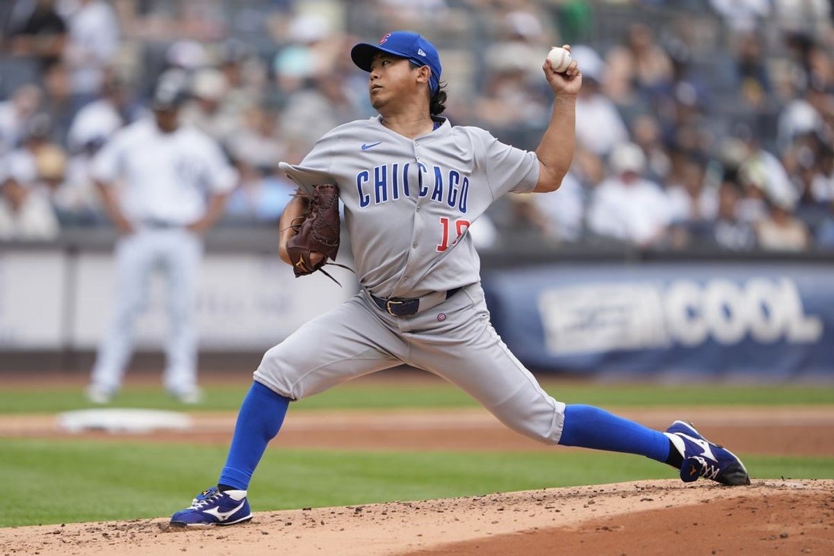 Jul 13, 2025; Bronx, New York, USA; Chicago Cubs pitcher Shota Imanaga (18) delivers a pitch against the New York Yankees during the second inning at Yankee Stadium. Mandatory Credit: Gregory Fisher-Imagn Images