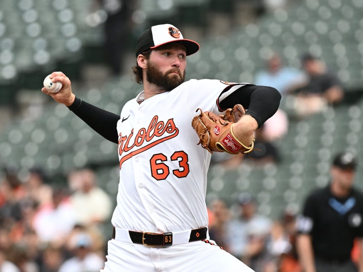 Jul 13, 2025; Baltimore, Maryland, USA;  Baltimore Orioles starting pitcher Brandon Young (63) delivers a pitch during the first inning against the Miami Marlins at Oriole Park at Camden Yards. Mandatory Credit: James A. Pittman-Imagn Images