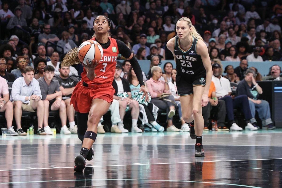 Jul 13, 2025; Brooklyn, New York, USA;  Atlanta Dream guard Jordin Canada (3) drives past New York Liberty guard Marine Johannes (23) in the first quarter at Barclays Center. Mandatory Credit: Wendell Cruz-Imagn Images