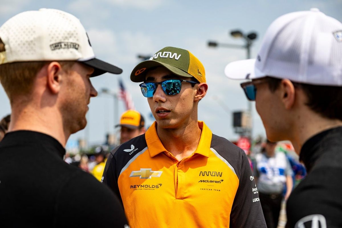 Nolan Siegel (6) talks with other drivers before the NTT IndyCar Series Farm to Finish 275 on July 13, 2025, at Iowa Speedway in Newton, Iowa. Alex Palou (10) won the race.