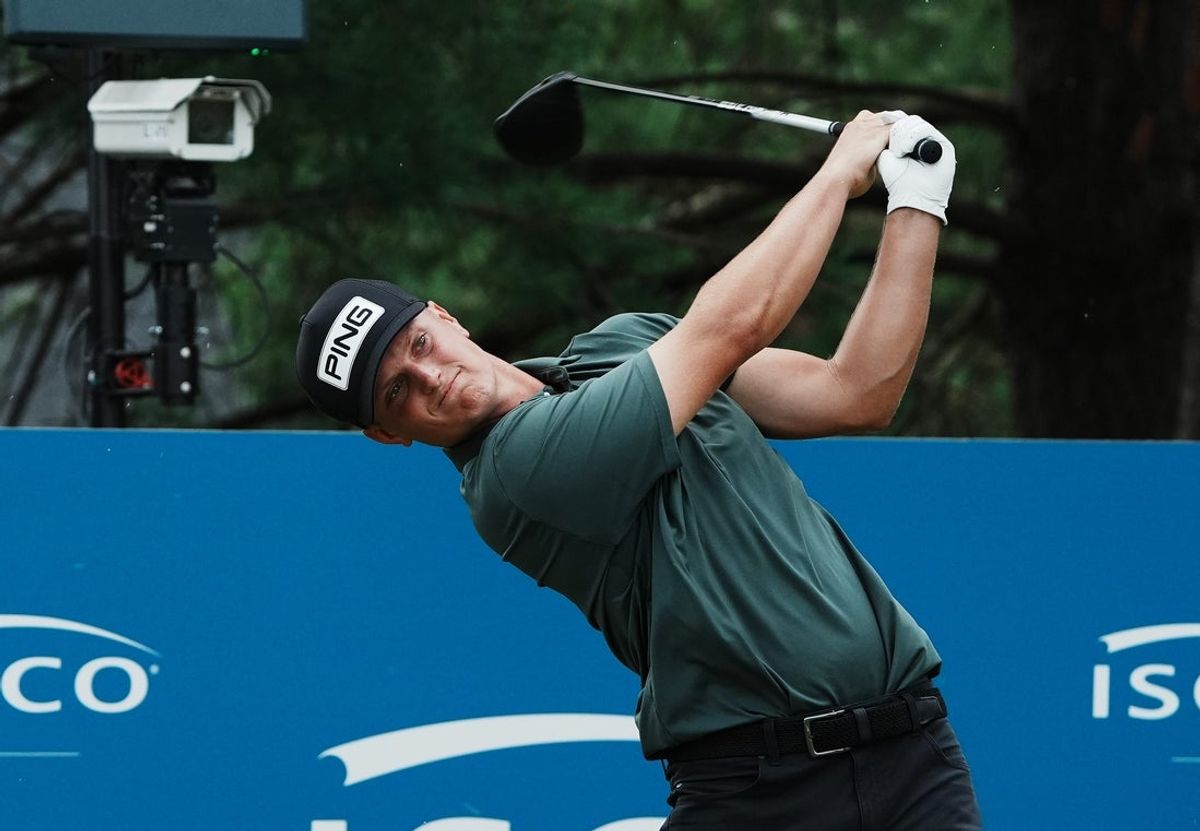 William Mouw watches his shot off the 18th tee during the fourth round of the ISCO Championship golf tournament at the Hurstbourne Country Club in Louisville, Ky. on July 13, 2025. He finished at 10 under par for the tournment.