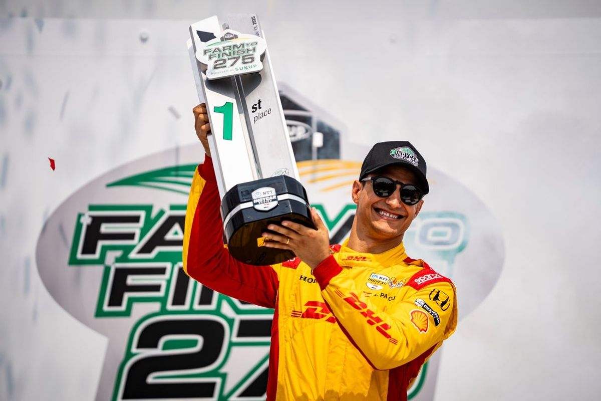 Alex Palou (10) celebrates in victory lane after the NTT IndyCar Series Farm to Finish 275 on July 13, 2025, at Iowa Speedway in Newton, Iowa. Palou (10) won the race.