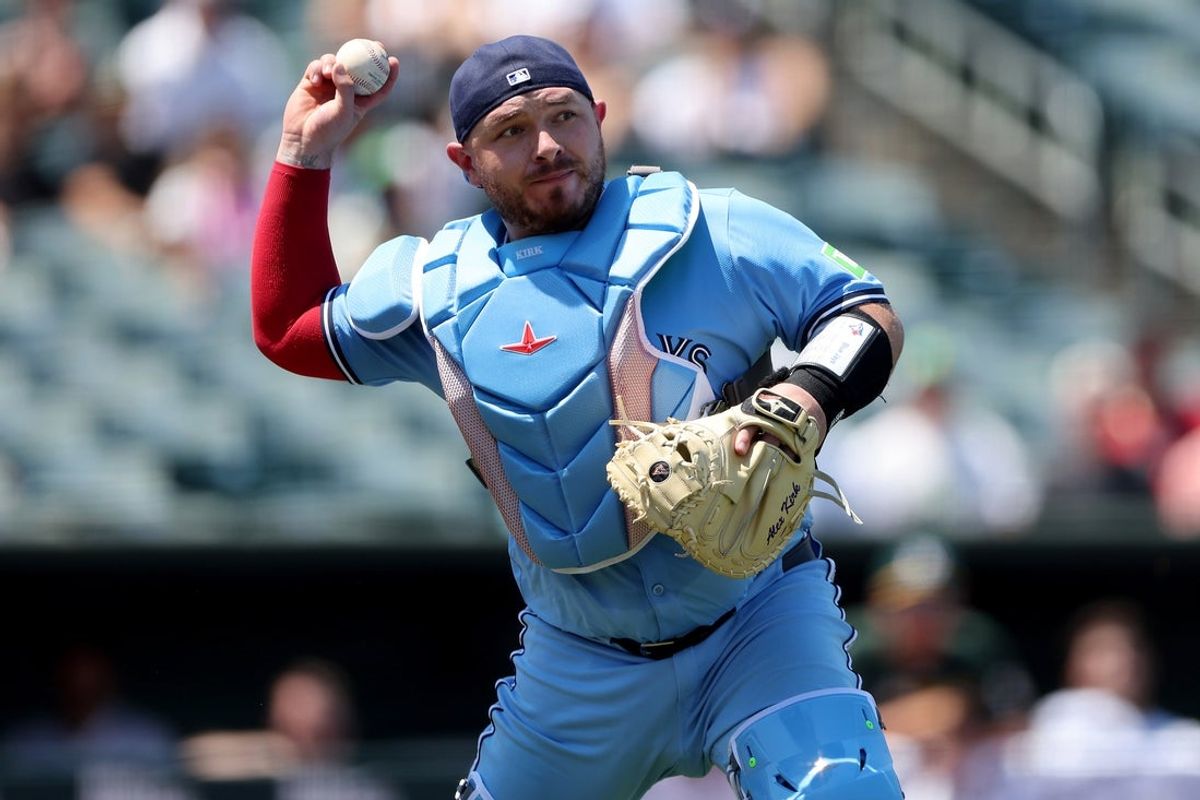 Jul 13, 2025; West Sacramento, California, USA; Toronto Blue Jays catcher Alejandro Kirk (30) throws to first base for an out against the Athletics during the fourth inning at Sutter Health Park. Mandatory Credit: Dennis Lee-Imagn Images