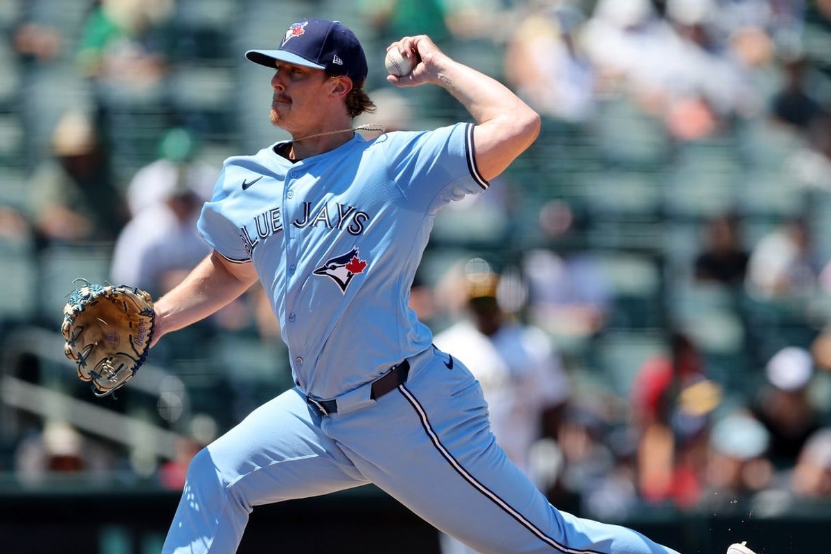 Jul 13, 2025; West Sacramento, California, USA; Toronto Blue Jays pitcher Justin Bruihl (58) throws a pitch against the Athletics during the fifth inning at Sutter Health Park. Mandatory Credit: Dennis Lee-Imagn Images