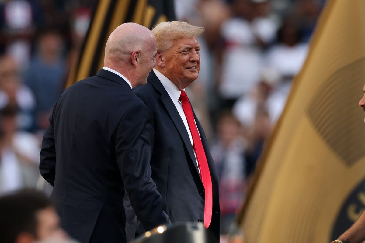Jul 13, 2025; East Rutherford, New Jersey, USA; U.S. President Donald Trump and FIFA president Gianni Infantino on stage during the final of the 2025 FIFA Club World Cup at MetLife Stadium. Mandatory Credit: Vincent Carchietta-Imagn Images
