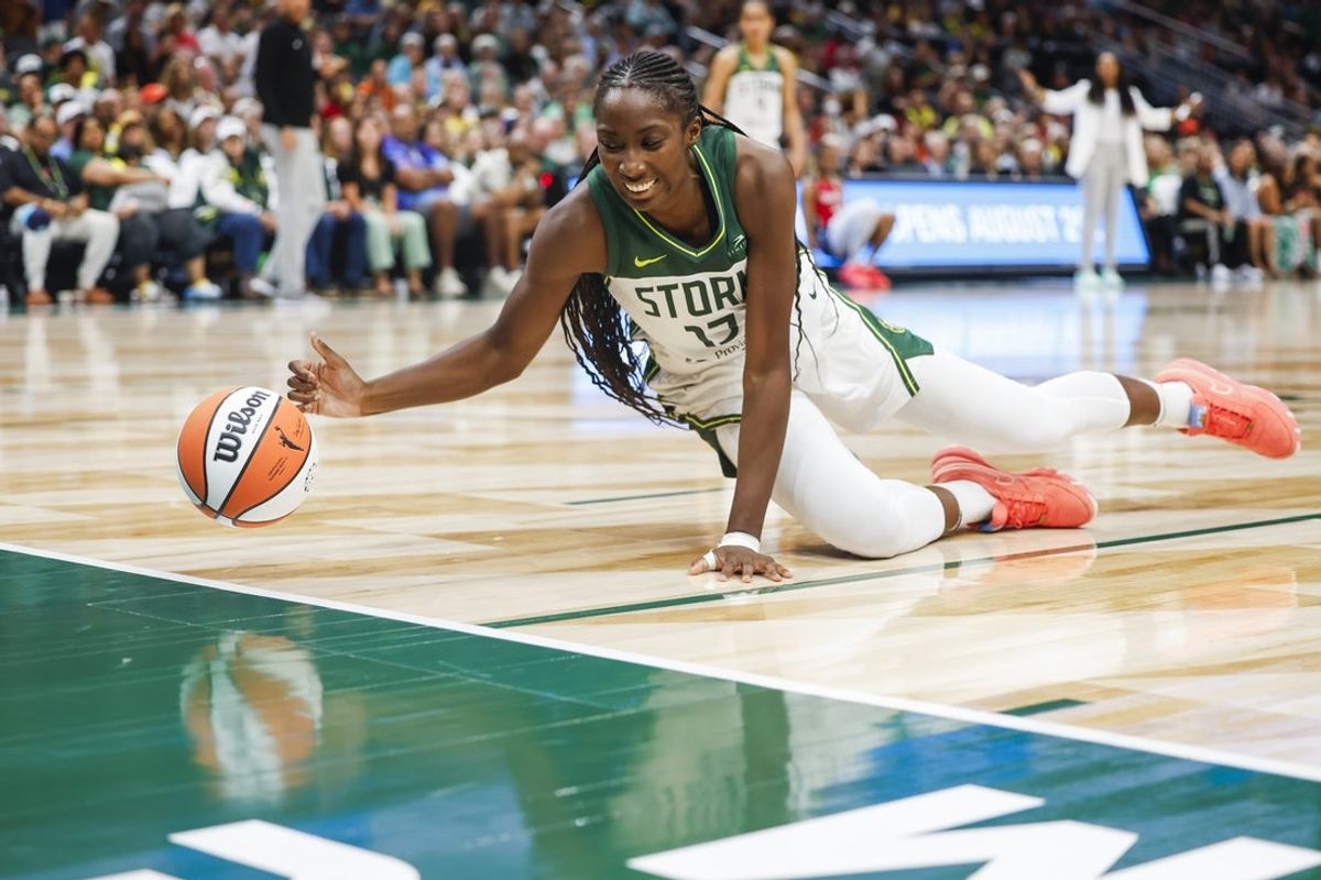 Jul 13, 2025; Seattle, Washington, USA; Seattle Storm forward Ezi Magbegor (13) knocks a ball out of bounds against the Washington Mystics during the fourth quarter at Climate Pledge Arena. Mandatory Credit: Joe Nicholson-Imagn Images