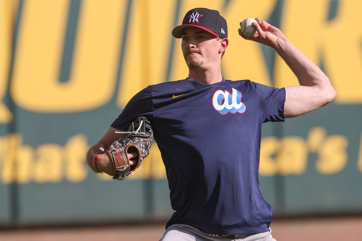 Jul 14, 2025; Atlanta, GA, USA; American League pitcher Max Fried (54) of the New York Yankees throws during workouts before the 2025 MLB All Star Game at Truist Park. Mandatory Credit: Brett Davis-Imagn Images