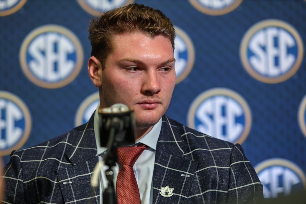 Jul 15, 2025; Atlanta, GA, USA; Auburn Tigers offensive lineman Connor Lew answers questions from the media during SEC Media Days at Omni Atlanta Hotel. Mandatory Credit: Jordan Godfree-Imagn Images