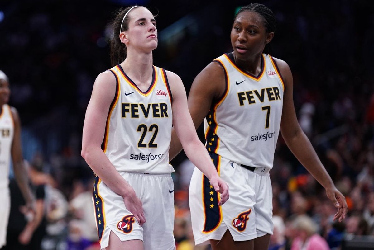 Jul 15, 2025; Boston, Massachusetts, USA; Indiana Fever guard Caitlin Clark (22) reacts with a possible injury after a play against the Connecticut Sun in the second half at TD Garden. Mandatory Credit: David Butler II-Imagn Images