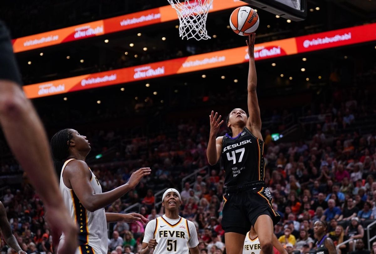 Jul 15, 2025; Boston, Massachusetts, USA; Connecticut Sun guard Leila Lacan (47) drives the ball to the basket against the Indiana Fever in the second half at TD Garden. Mandatory Credit: David Butler II-Imagn Images