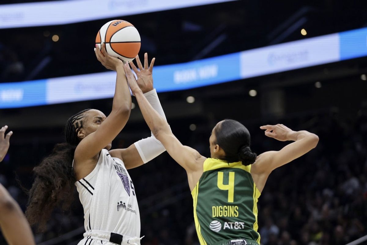 Jul 16, 2025; Seattle, Washington, USA; Golden State Valkyries forward Kayla Thornton (5) shoots over Seattle Storm guard Skylar Diggins (4) during the first half at Climate Pledge Arena. Mandatory Credit: John Froschauer-Imagn Images