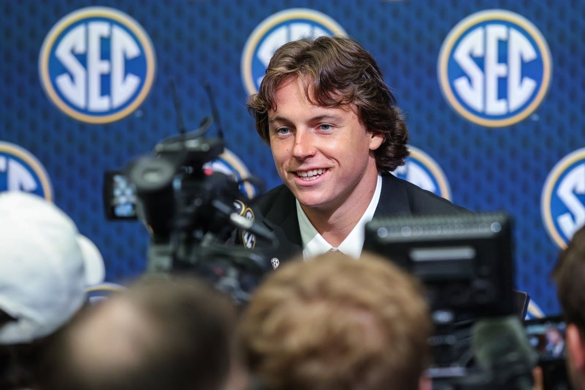 Jul 16, 2025; Atlanta, GA, USA; Oklahoma Sooners quarterback John Mateer answers questions from the media during the SEC Media Days at Omni Atlanta Hotel. Mandatory Credit: Jordan Godfree-Imagn Images