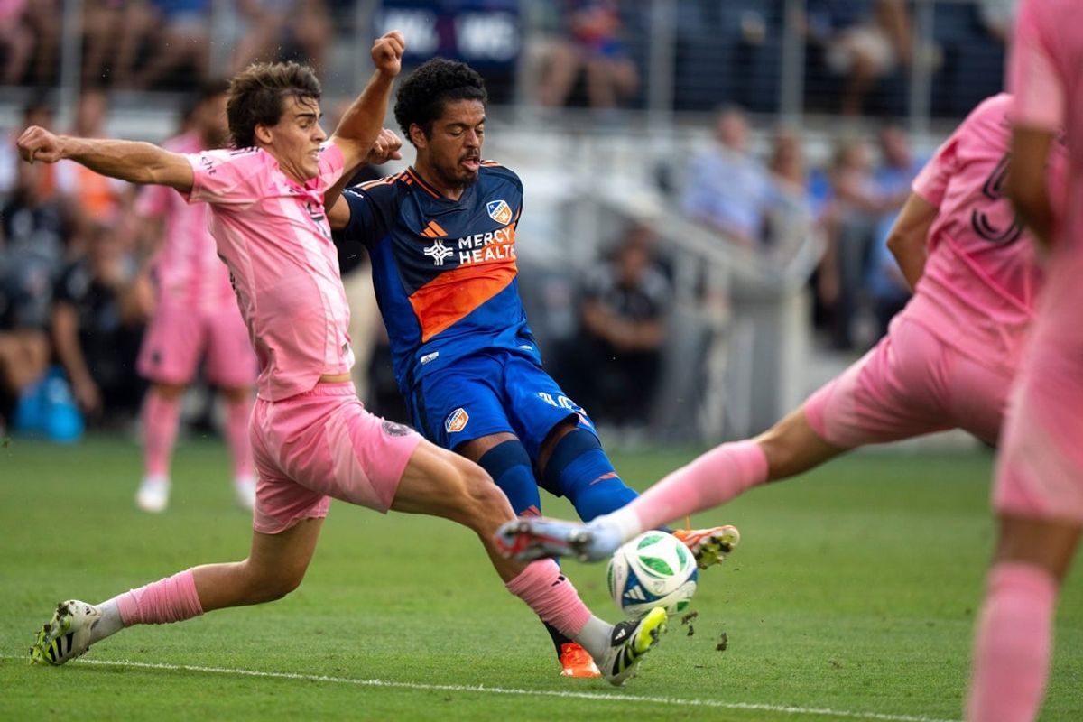 Inter Miami midfielder Benjamin Cremaschi (30) blocks a shot attempt by FC Cincinnati midfielder Evander (10) in the first half of the match between FC Cincinnati and Inter Miami in Cincinnati on Wednesday, July 16, 2025.