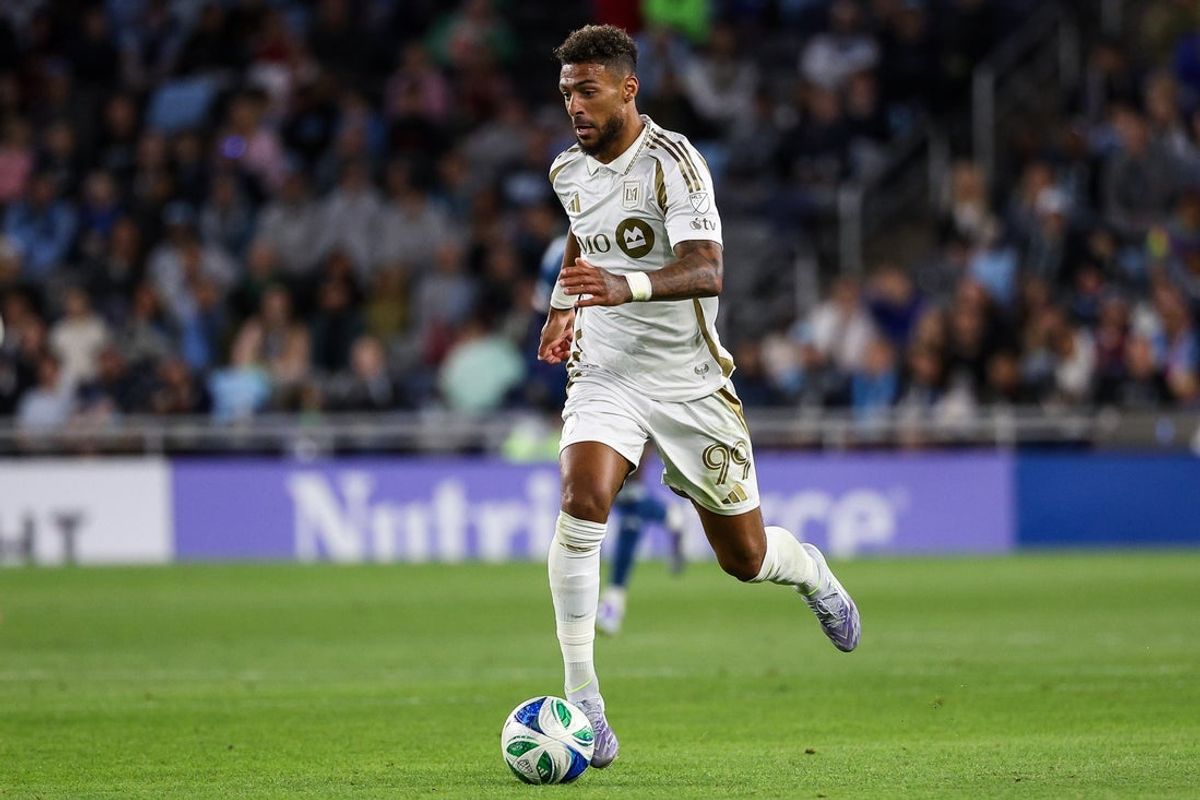 Jul 16, 2025; Saint Paul, Minnesota, USA; Los Angeles FC forward Denis Bouanga (99) dribbles the ball up field against the Minnesota United during the second half at Allianz Field. Mandatory Credit: Matt Krohn-Imagn Images
