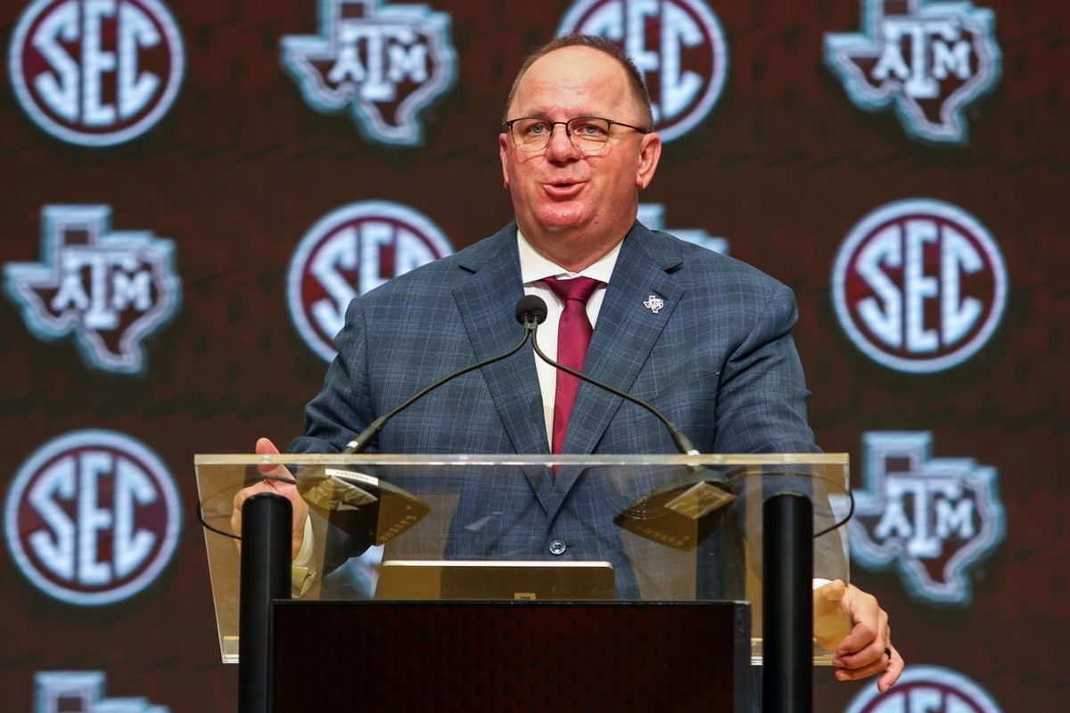 Jul 17, 2025; Atlanta, GA, USA; Texas A&M Aggies head coach Mike Elko talks to the media during the SEC Media Days at Omni Atlanta Hotel. Mandatory Credit: Jordan Godfree-Imagn Images