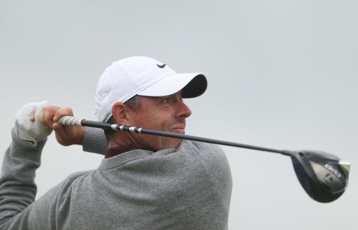 Jul 17, 2025; Portrush, IRL; Rory McIlroy hits a shot on the 12th hole during the first round of The 153rd Open Championship golf tournament at Royal Portrush. Mandatory Credit: Mike Frey-Imagn Images