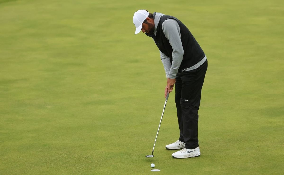 Jul 18, 2025; Portrush, IRL; Scottie Scheffler putts on the  12th hole during the second round of The 153rd Open Championship golf tournament. Mandatory Credit: Mike Frey-Imagn Images
