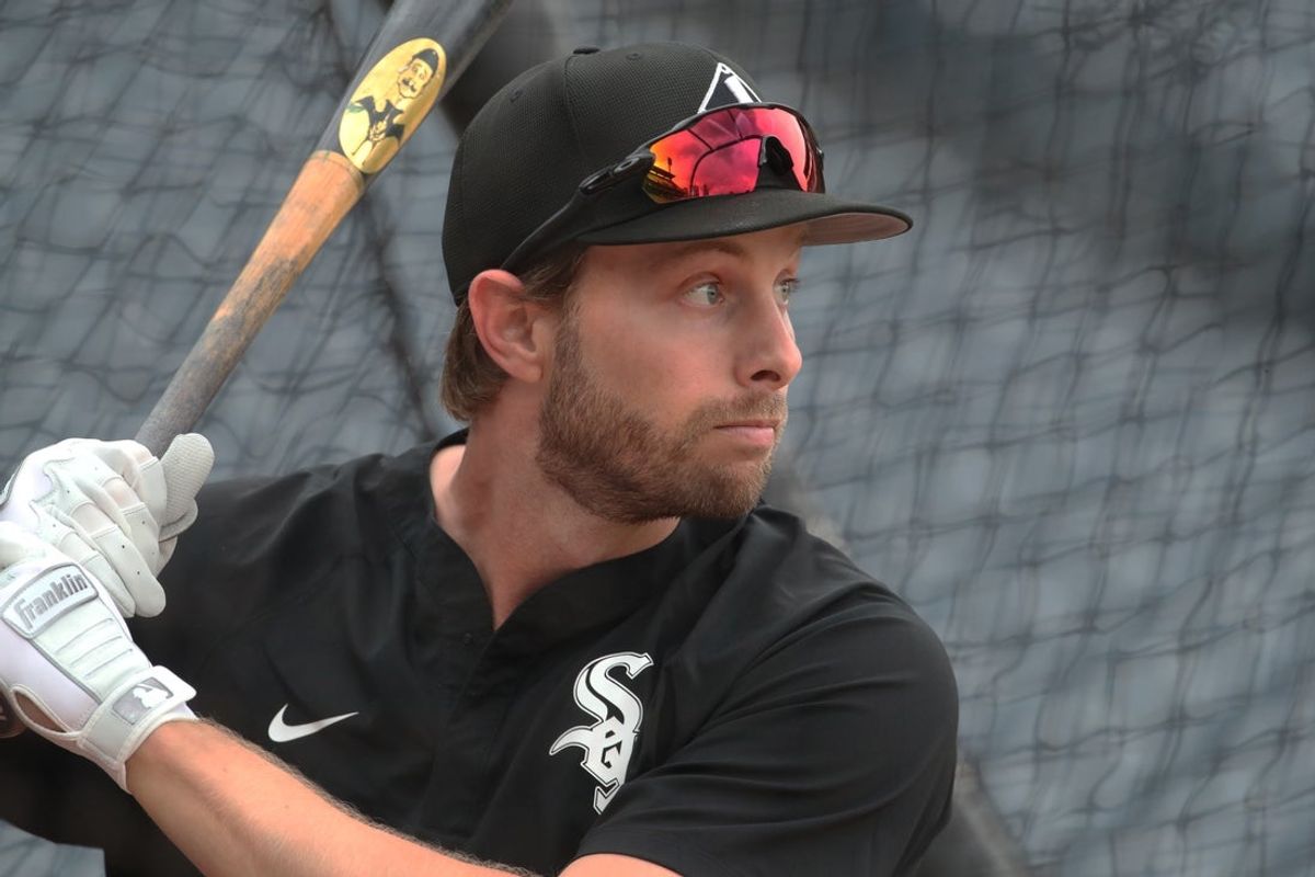 Jul 18, 2025; Pittsburgh, Pennsylvania, USA;  Chicago White Sox right fielder Austin Slater (15) in the batting cage before the game against the Pittsburgh Pirates at PNC Park. Mandatory Credit: Charles LeClaire-Imagn Images