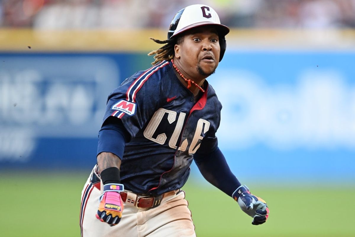 Jul 18, 2025; Cleveland, Ohio, USA; Cleveland Guardians third baseman Jose Ramirez (11) advances to third with a triple during the third inning against the Athletics at Progressive Field. Mandatory Credit: Ken Blaze-Imagn Images