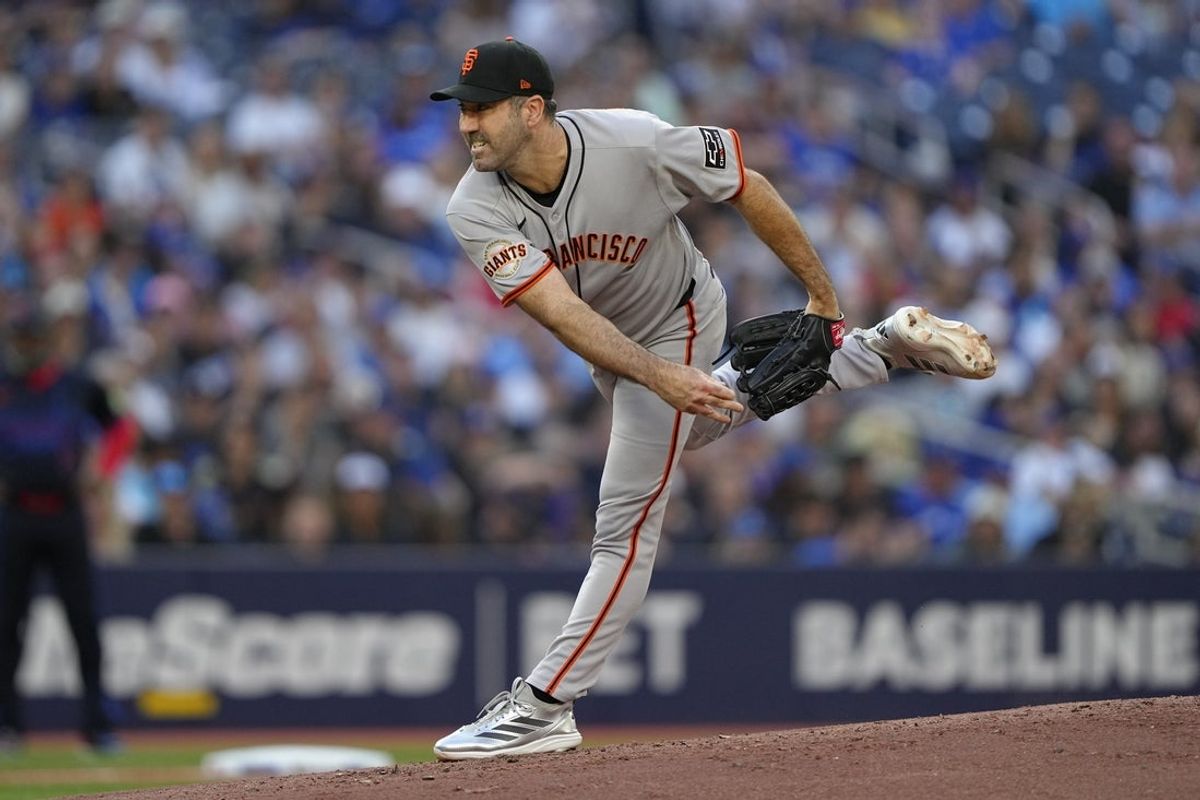 Jul 18, 2025; Toronto, Ontario, CAN; San Francisco Giants starting pitcher Justin Verlander (35) pitches to the Toronto Blue Jays during the first inning at Rogers Centre. Mandatory Credit: John E. Sokolowski-Imagn Images