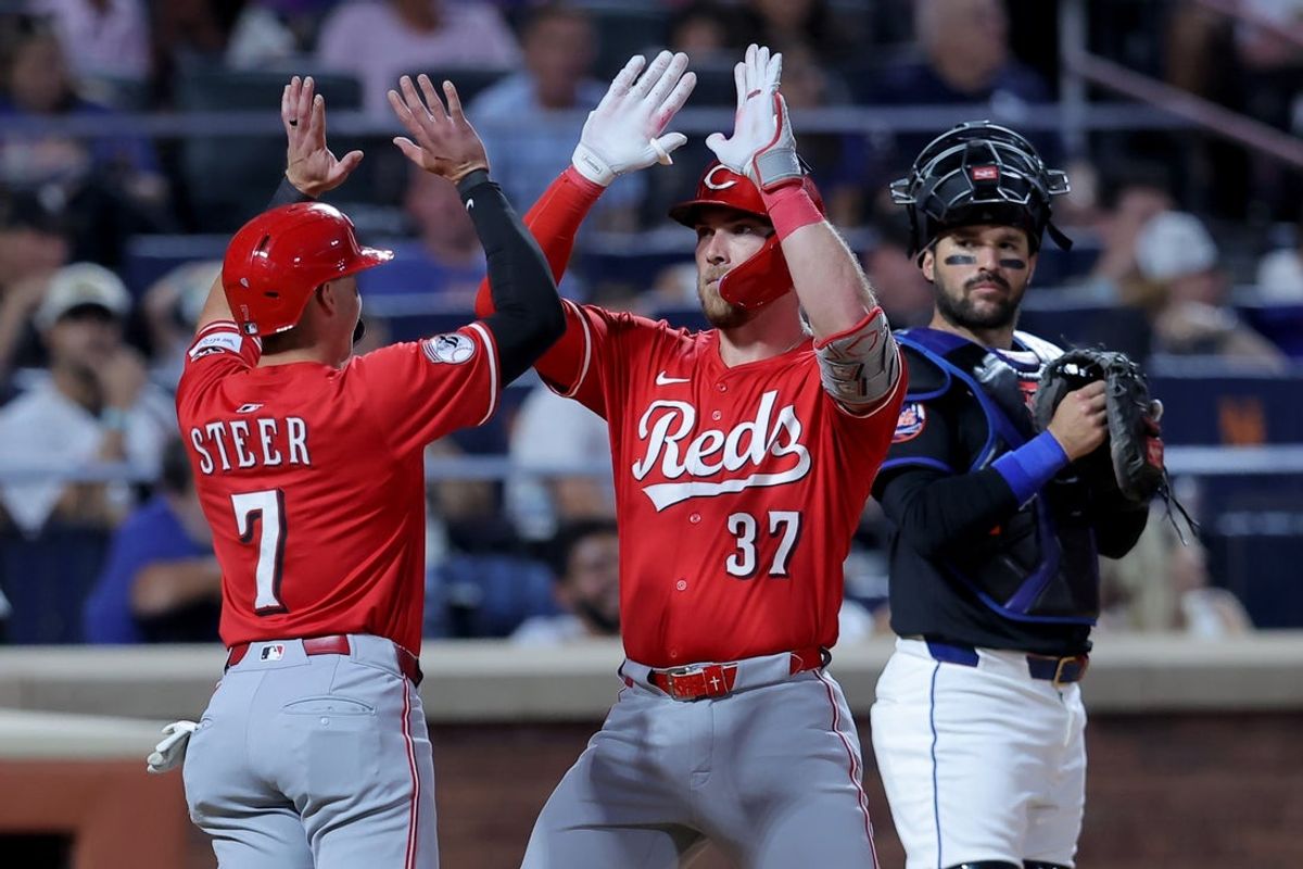 Jul 18, 2025; New York City, New York, USA; Cincinnati Reds designated hitter Tyler Stephenson (37) celebrates his two run home run against the New York Mets with first baseman Spencer Steer (7) in front of Mets catcher Luis Torrens (13) during the sixth inning at Citi Field. Mandatory Credit: Brad Penner-Imagn Images