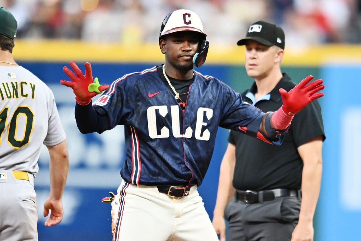 Jul 18, 2025; Cleveland, Ohio, USA; Cleveland Guardians center fielder Angel Martínez (1) reacts after hitting a double during the sixth inning against the Athletics at Progressive Field. Mandatory Credit: Ken Blaze-Imagn Images