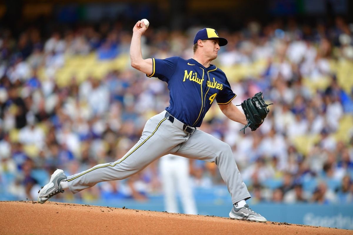 Jul 18, 2025; Los Angeles, California, USA; Milwaukee Brewers pitcher Quinn Priester (46) pitches against the Los Angeles Dodgers in the first inning at Dodger Stadium. Mandatory Credit: Gary A. Vasquez-Imagn Images