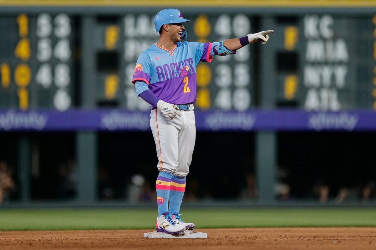 Jul 18, 2025; Denver, Colorado, USA; Colorado Rockies right fielder Tyler Freeman (2) reacts from second on a ground rule double in the sixth inning against the Minnesota Twins at Coors Field. Mandatory Credit: Isaiah J. Downing-Imagn Images