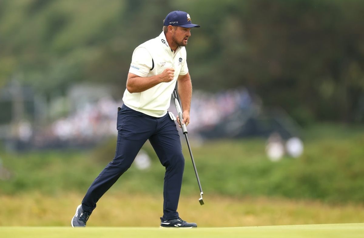 Jul 19, 2025; Portrush, IRL; Bryson Dechambeau reacts after a putt on the 14th hole during the third round of The 153rd Open Championship golf tournament. Mandatory Credit: Mike Frey-Imagn Images