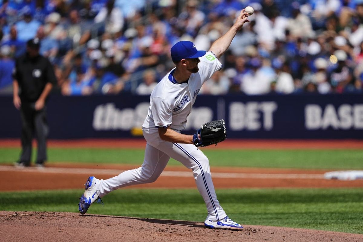 Jul 19, 2025; Toronto, Ontario, CAN; Toronto Blue Jays starting pitcher Eric Lauer (56) pitches to the San Francisco Giants during the first inning at Rogers Centre. Mandatory Credit: John E. Sokolowski-Imagn Images