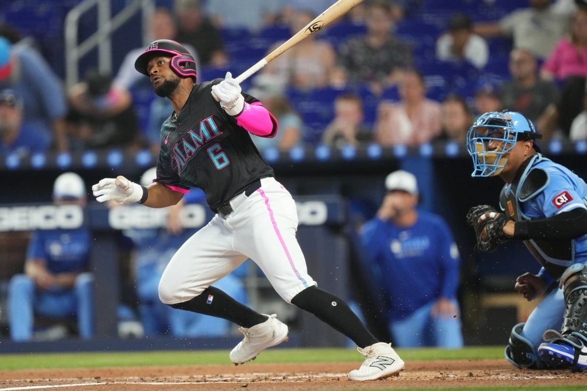 Jul 19, 2025; Miami, Florida, USA;  Miami Marlins shortstop Otto Lopez (6) grounds out to third base for an RBI in the first inning against the Kansas City Royals at loanDepot Park. Mandatory Credit: Jim Rassol-Imagn Images