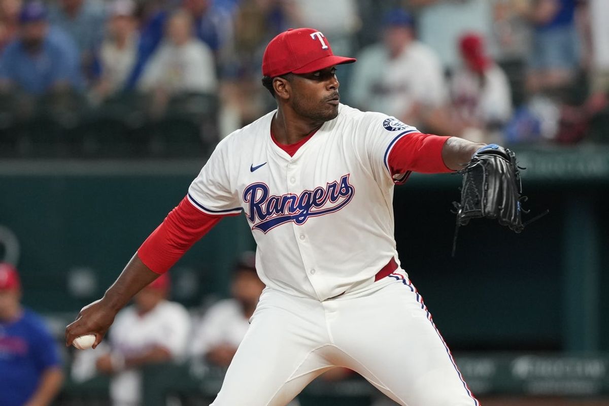 Jul 19, 2025; Arlington, Texas, USA; Texas Rangers starting pitcher Kumar Rocker (80) delivers a pitch to the Detroit Tigers during the first inning at Globe Life Field. Mandatory Credit: Jim Cowsert-Imagn Images
