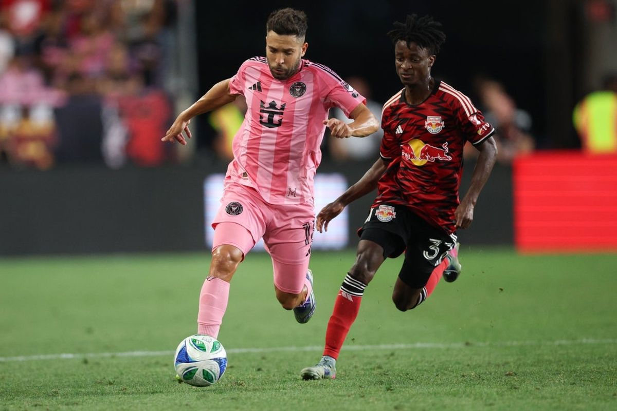 Jul 19, 2025; Harrison, New Jersey, USA; Inter Miami CF defender Jordi Alba (18) plays the ball against New York Red Bulls forward Mohammed Sofo (37) during the first half at Sports Illustrated Stadium. Mandatory Credit: Vincent Carchietta-Imagn Images