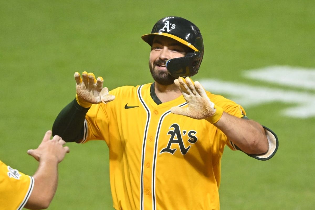 Jul 19, 2025; Cleveland, Ohio, USA; Athletics designated hitter Shea Langeliers (23) celebrates his two-run home run in the eighth inning against the Cleveland Guardians at Progressive Field. Mandatory Credit: David Richard-Imagn Images
