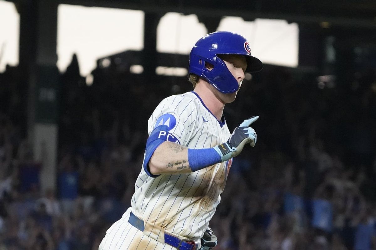 Jul 19, 2025; Chicago, Illinois, USA;Chicago Cubs outfielder Pete Crow-Armstrong (4) gestures after hitting a home run against the Boston Red Sox during the eighth inning  at Wrigley Field. Mandatory Credit: David Banks-Imagn Images