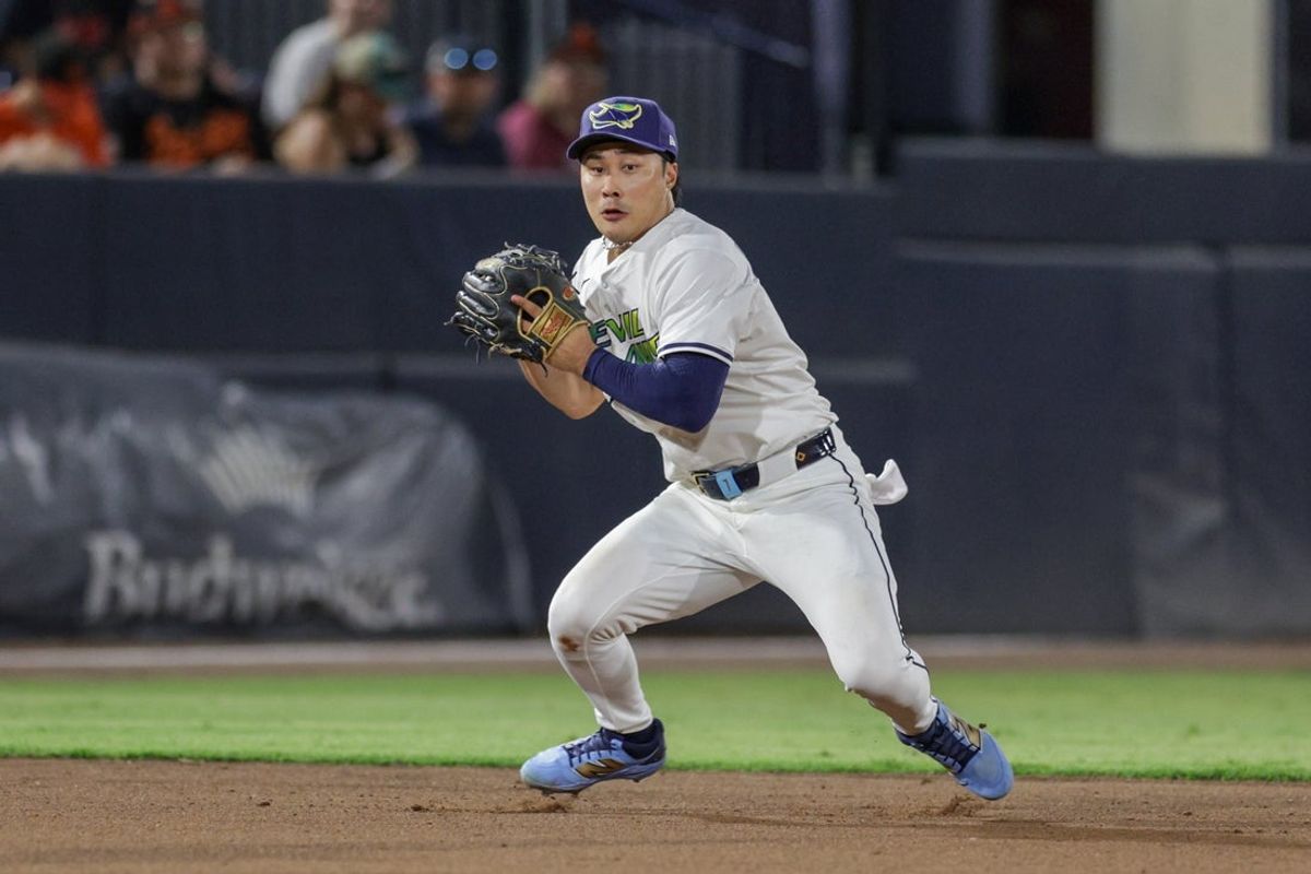 Jul 19, 2025; Tampa, Florida, USA; Tampa Bay Rays shortstop Ha-Seong Kim (7) fields the ball against the Baltimore Orioles in the eighth inning at George M. Steinbrenner Field. Mandatory Credit: Nathan Ray Seebeck-Imagn Images