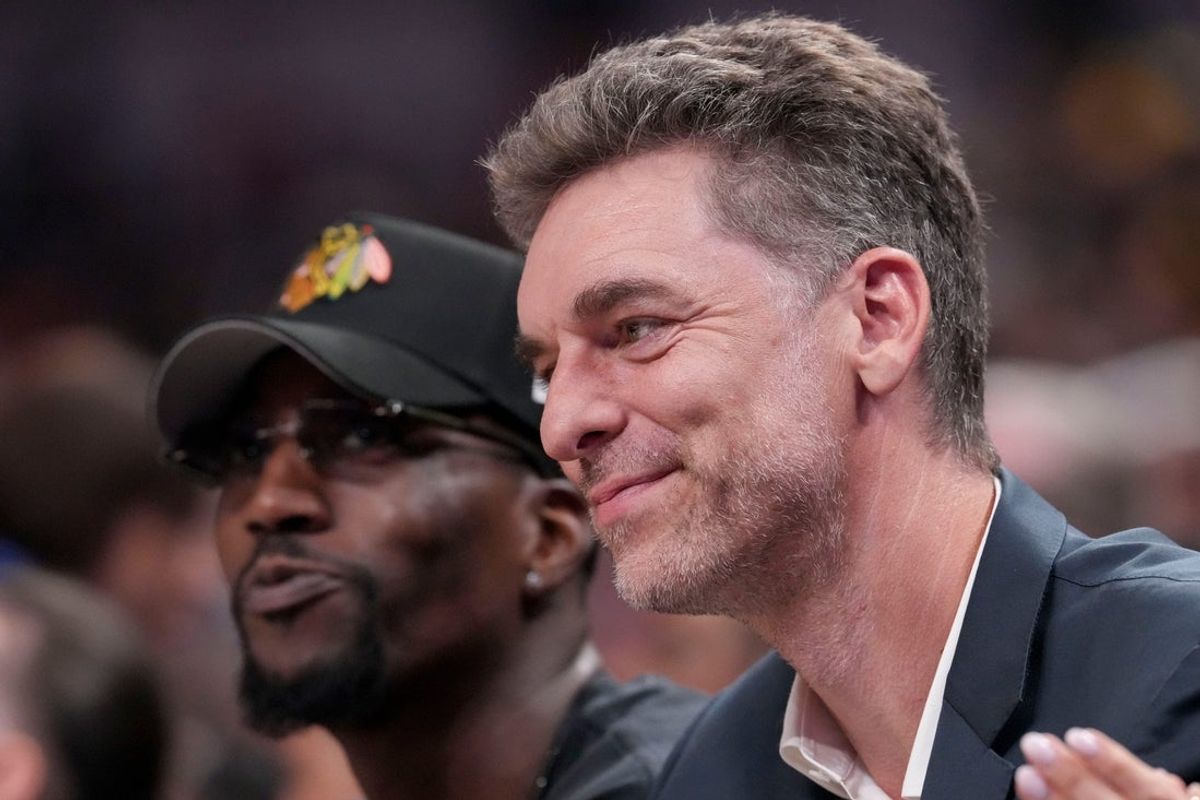 Bam Adebayo (left) and Pau Gasol watch the action on the court Saturday, July 19, 2025, during the WNBA All-Star Game at Gainbridge Fieldhouse in Indianapolis.