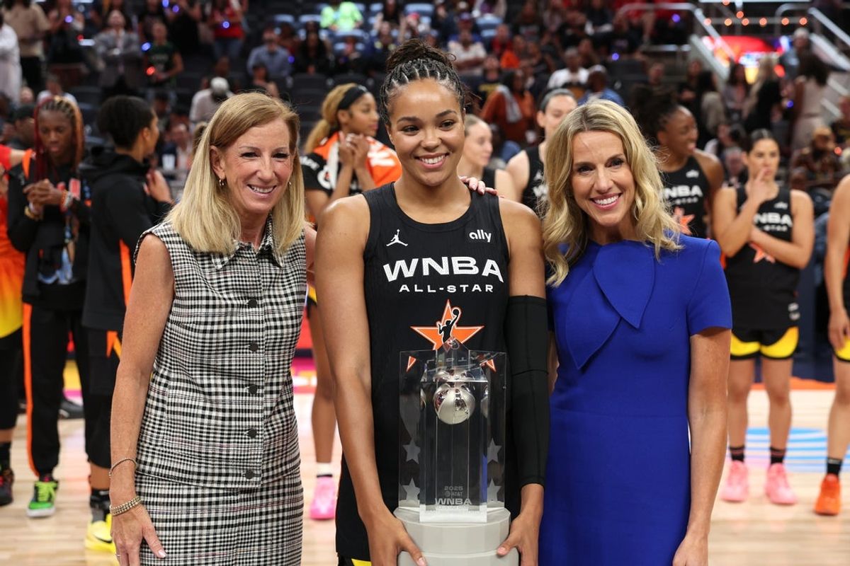 Jul 19, 2025; Indianapolis, IN, USA; Team Collier forward Napheesa Collier (24) celebrates with the trophy and commissioner Cathy Engelbert (left) after winning the 2025 WNBA All Star Game at Gainbridge Fieldhouse. Mandatory Credit: Trevor Ruszkowski-Imagn Images