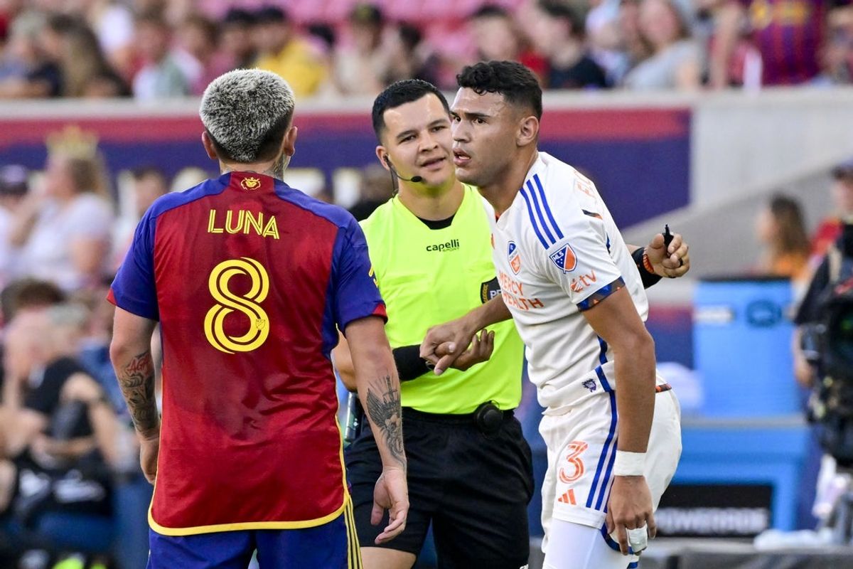 Jul 19, 2025; Sandy, Utah, USA; FC Cincinnati defender Gilberto Flores (3) stares down Real Salt Lake midfielder Diego Luna (8) after being tripped during the first half at America First Field. Mandatory Credit: Peter Creveling-Imagn Images